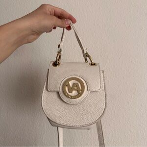 Elegant Cream Handbag with Gold Accents